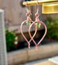 Green Cubic Zirconia Pear Shaped Copper Earrings - Image 1