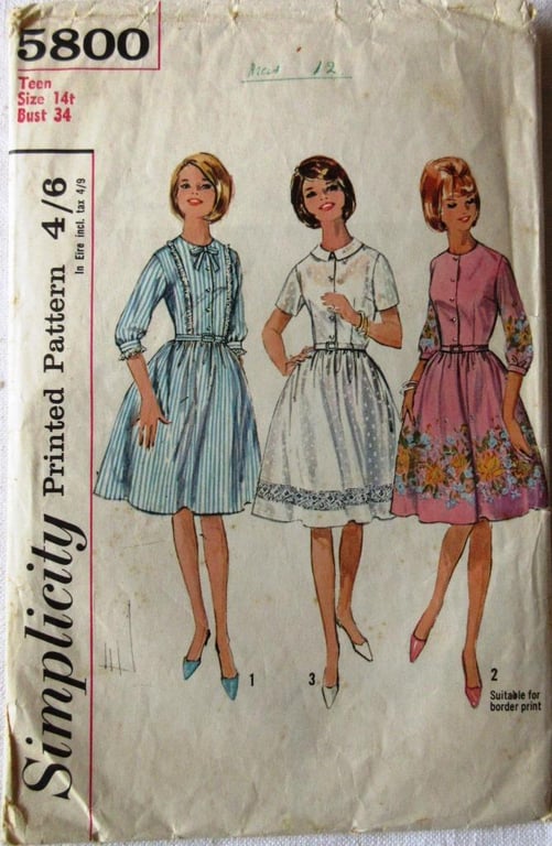 A vintage sewing pattern for a teen's shirtwaister dress in size 14t