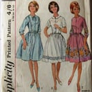 A vintage sewing pattern for a teen's shirtwaister dress in size 14t