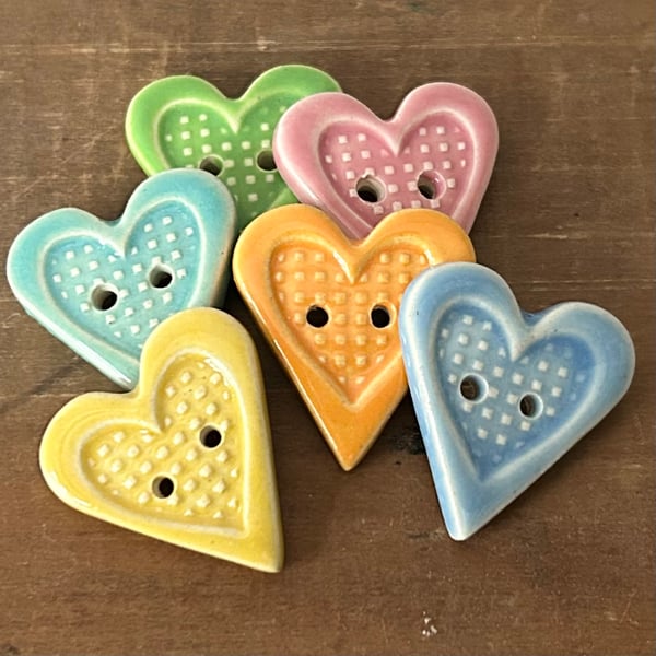 Set of six little heart shaped ceramic handmade buttons 