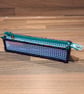 Pencil case - see-through with red, green, navy edge, green zip, yellow charm - Image 5