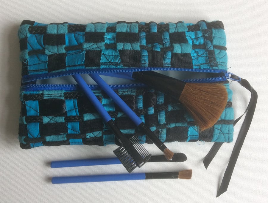 Turquoise and black, zipped, recycled woven fabric make up bag or pencil case