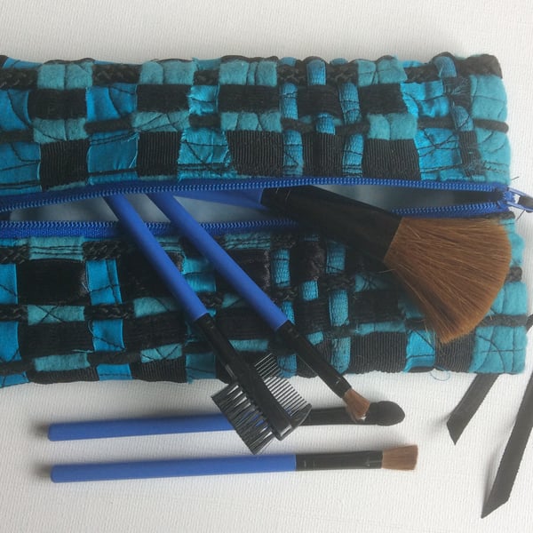 Turquoise and black, zipped, recycled woven fabric make up bag or pencil case