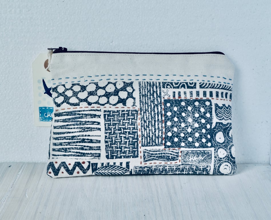 A unique hand printed pouch with hand embroidery made by Linda in Hampshire