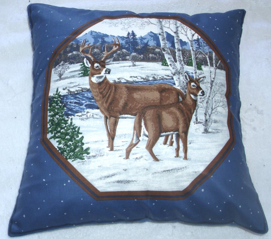 Deer and Stag standing by a river in a wintry forest cushion 