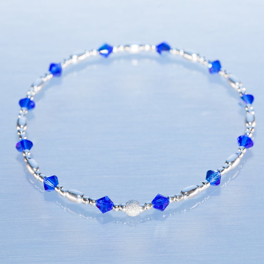 Dainty sterling silver bracelet with dark blue Swarovski