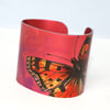 Red tortoiseshell butterfly cuff