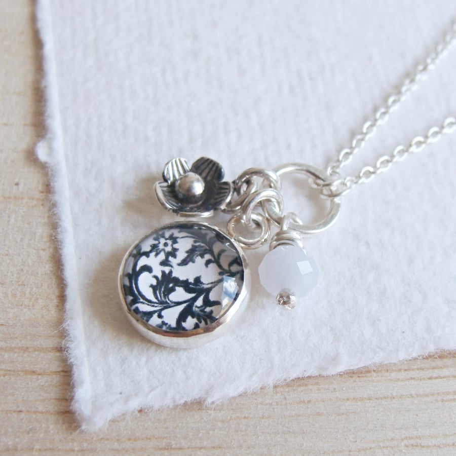 Floral Cluster Charm Necklace in Sterling Silver with Blue Agate Gemstone Bead