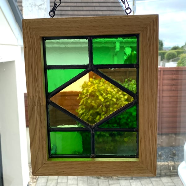 Stained glass window panel with Oak frame
