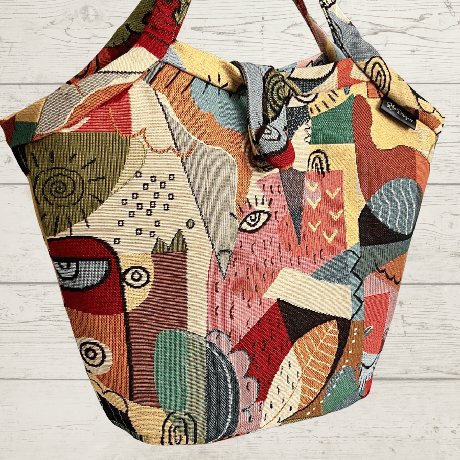 Bucket bag abstract faces 