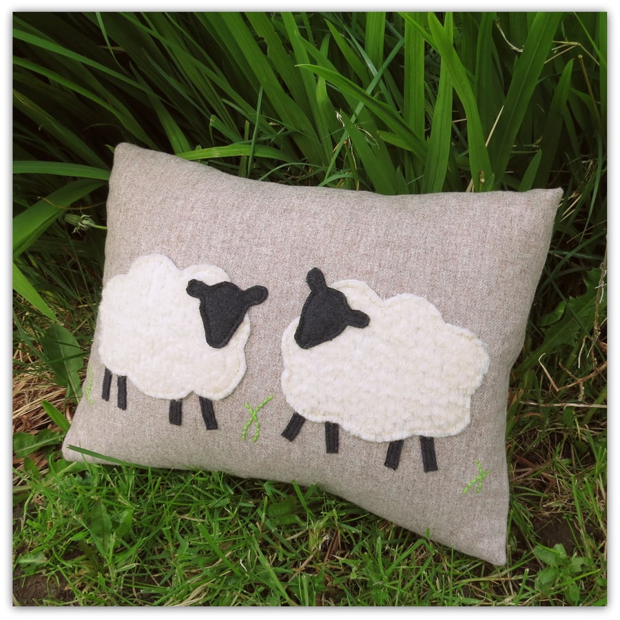 Sheep.  A 39cm x 27cm cushion,complete with feather pad.  Spring.