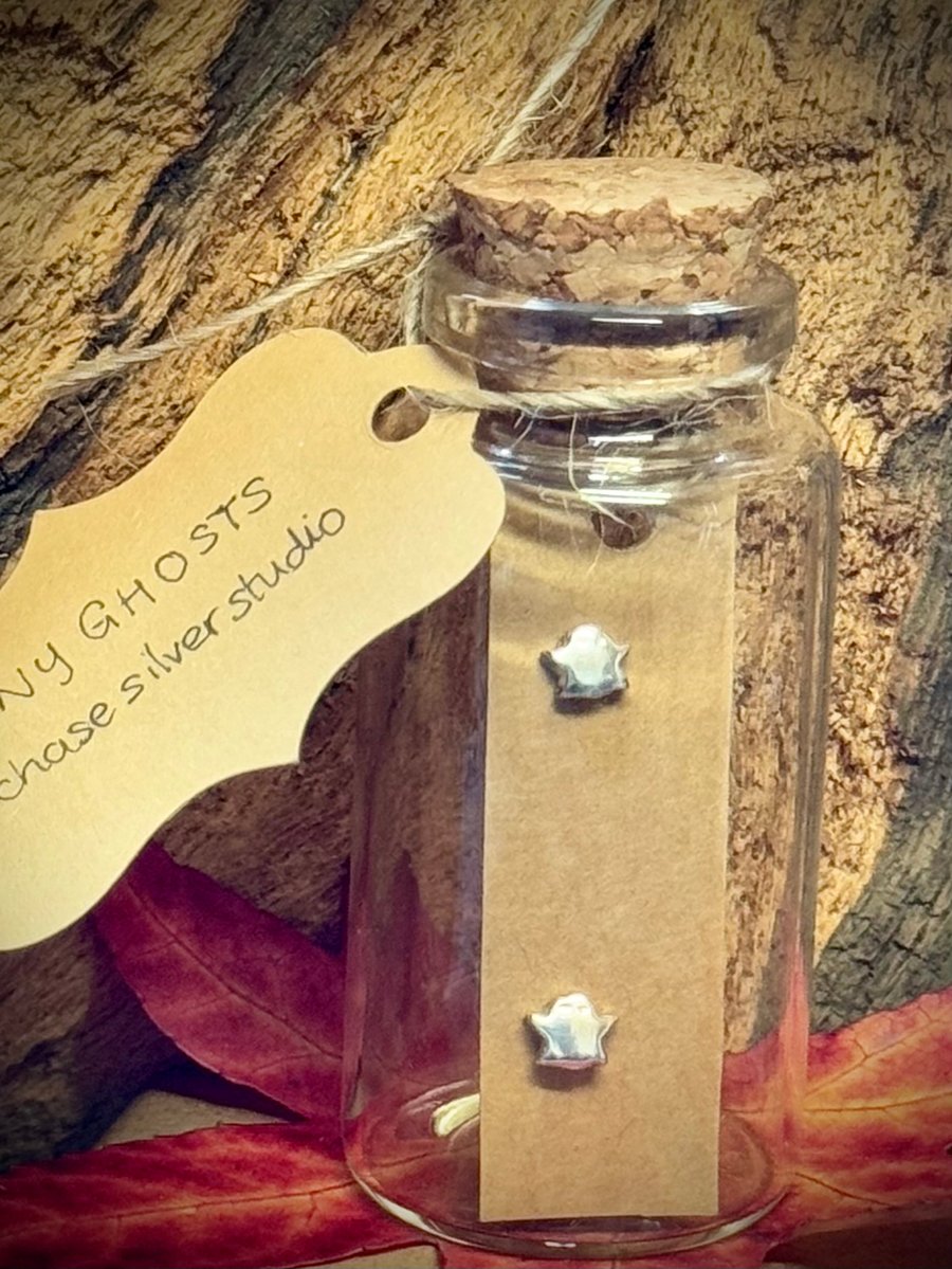 Tiny little silver ghost earrings 