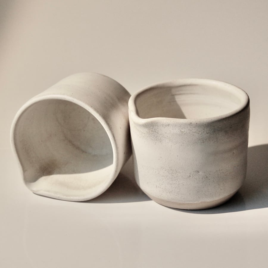 Tiny cream or milk pourer