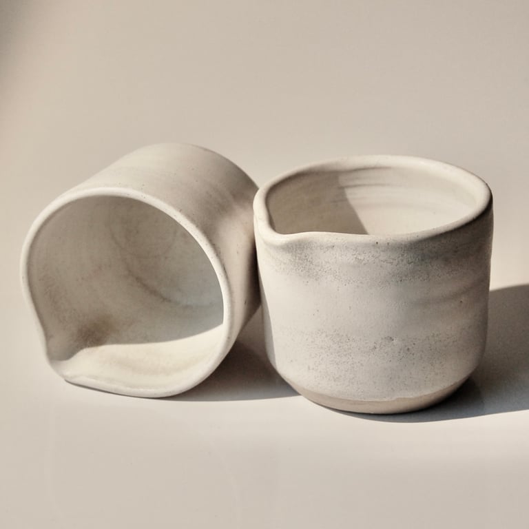 Tiny cream or milk pourer