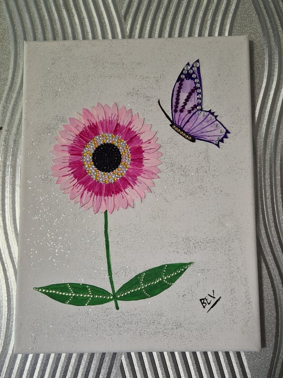 Pink flower and purple butterfly. 