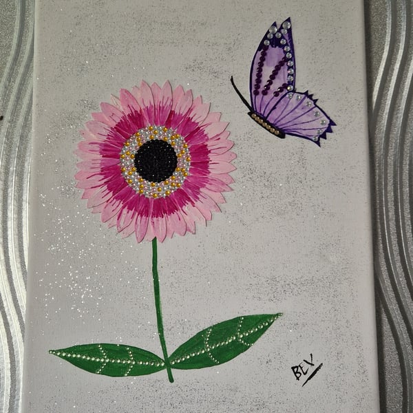 Pink flower and purple butterfly. 