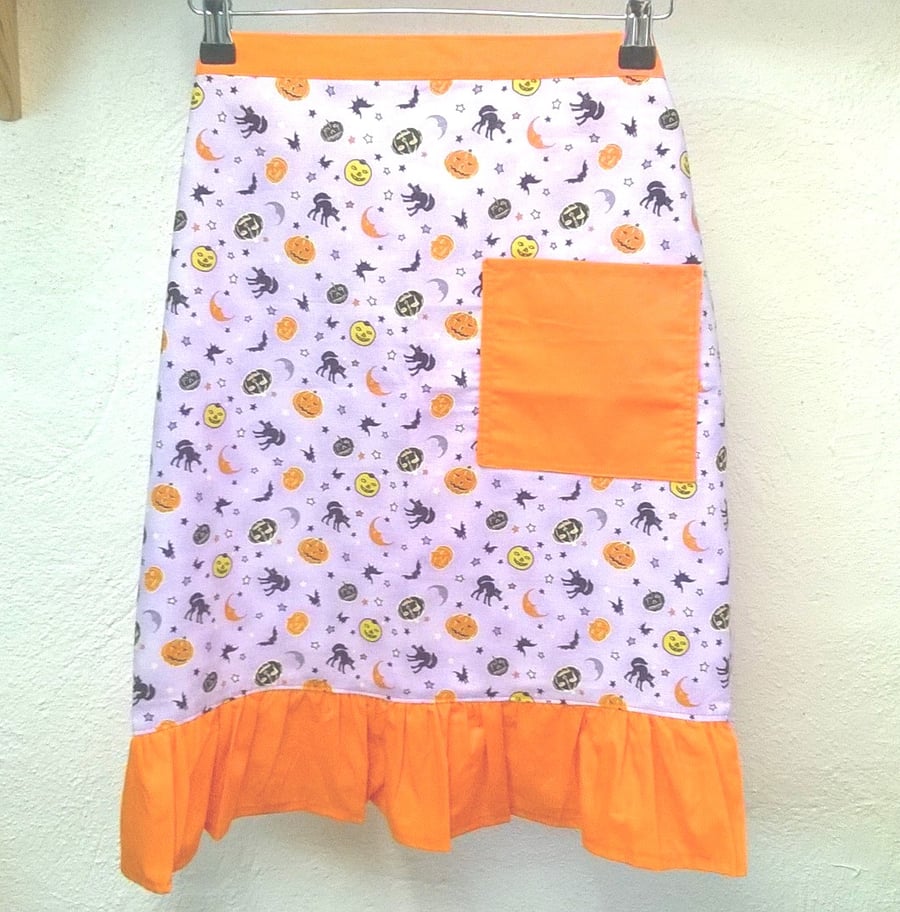 Halloween apron with pumpkins, black cats, bat and moons