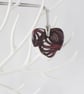 Filigree Artwork Design on Heart Shaped Ceramic Pendant on Grey Cord - Image 2