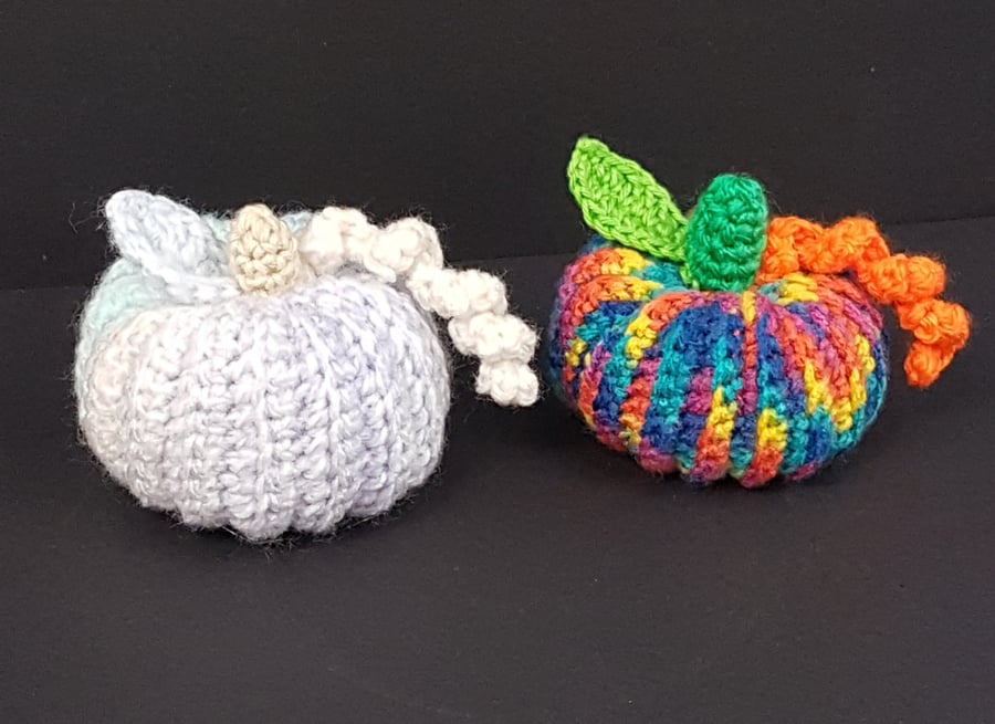 Two crochet pumpkins