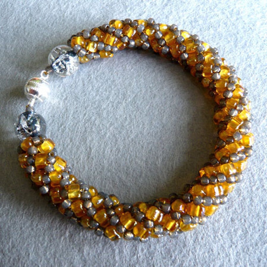 Gold and grey bracelet