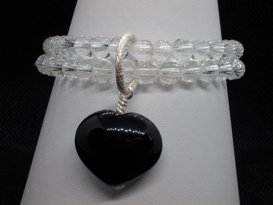 Clear quartz stacker bracelet with black agate charm