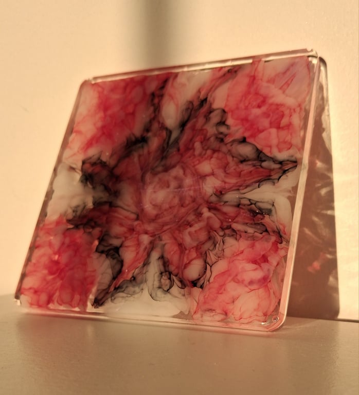 Handmade epoxy resin square coaster. Black, white and red