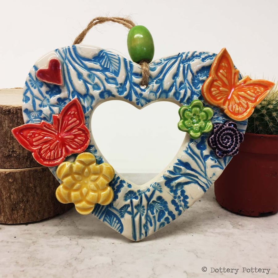Heart shaped Ceramic floral wreath decoration with butterflies and flowers 