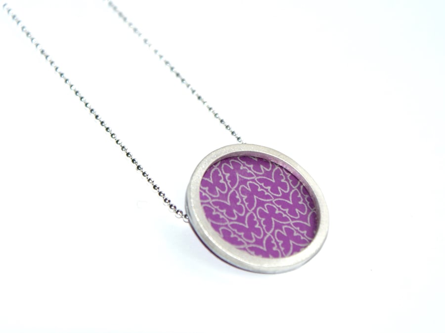 Silver and pink circle necklace - butterfly pattern