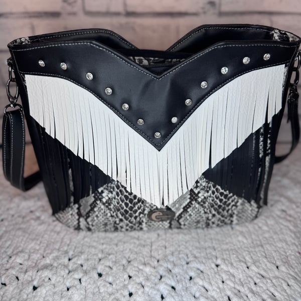 Medium sized Crossbody Faux leather bag with fringe in black, white &snakeskin