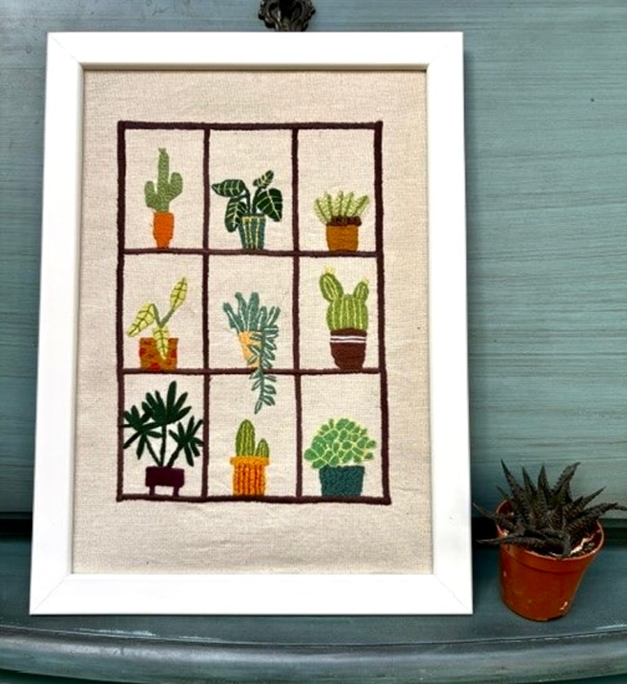 House plant embroidered picture.