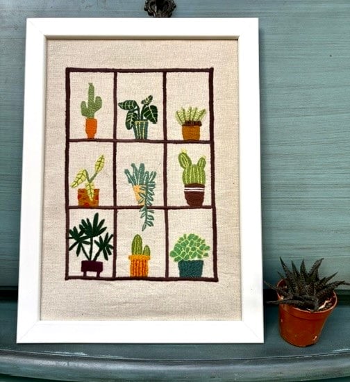 House plant embroidered picture.