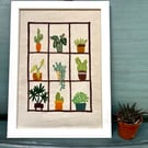 House plant embroidered picture.