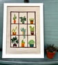 House plant embroidered picture.