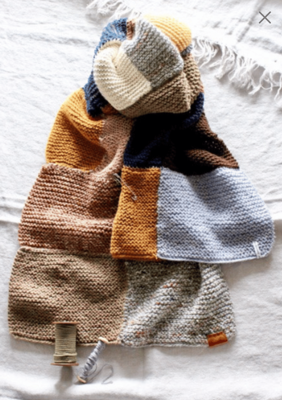 Hand-knitted patchwork scarf wrap