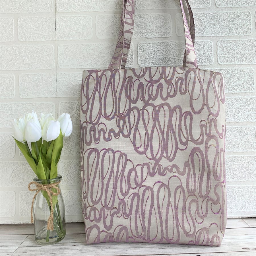 Lilac tote bag with lilac and mauve loops and swirls pattern