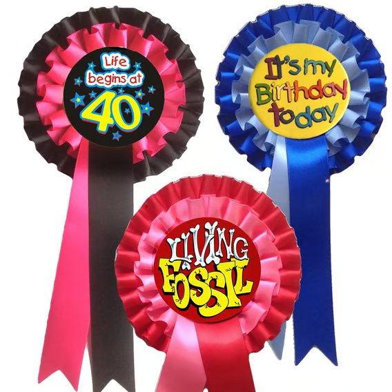 BIrthday Rosettes with Standard designs in the centre. Choice of ribbon. from