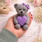 handmade needle felted teddy bear holding heart