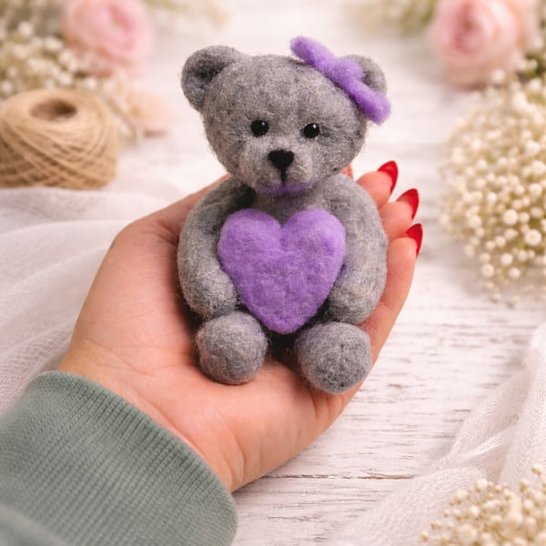handmade needle felted teddy bear holding heart