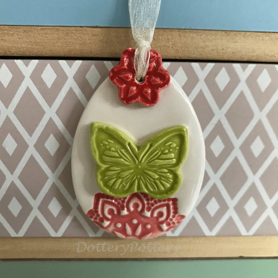 Pottery Easter Egg decoration with butterfly