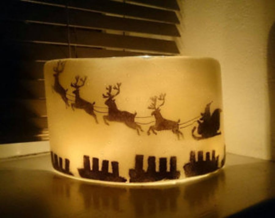 Christmas Arch Santa on his sleigh, perfect for a candle behind