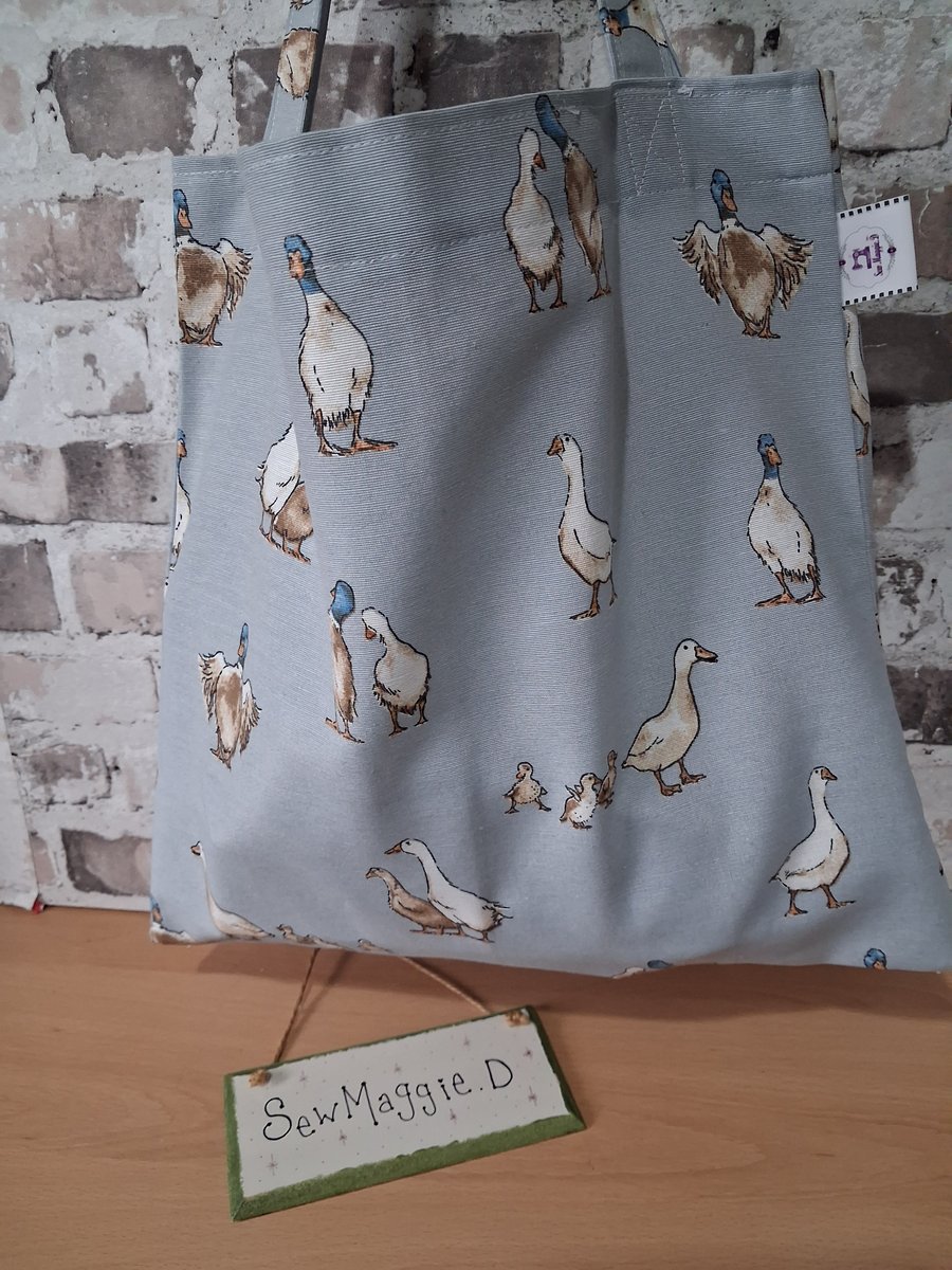 DUCKS ON BLUE SUSTAINABLE UNLINED TOTE BAG