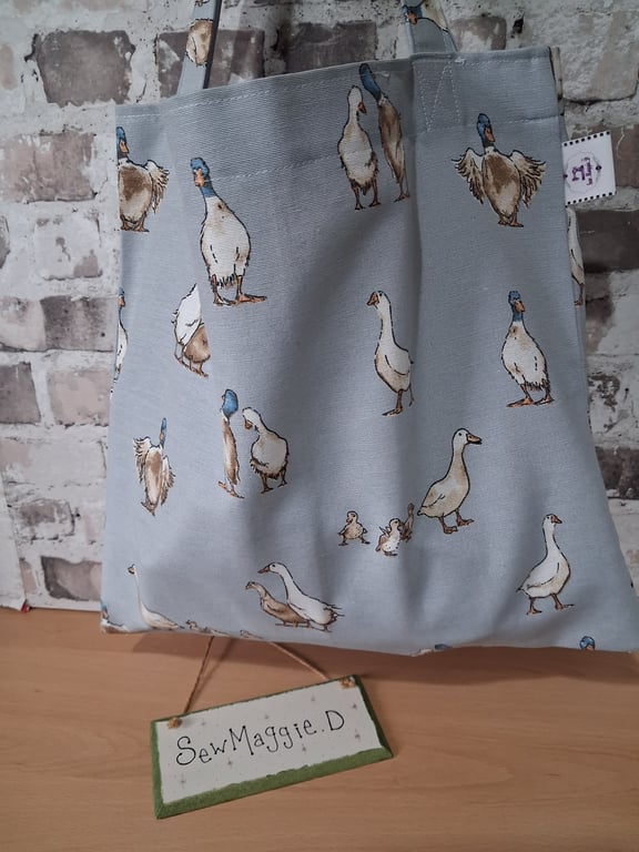 DUCKS ON BLUE SUSTAINABLE UNLINED TOTE BAG