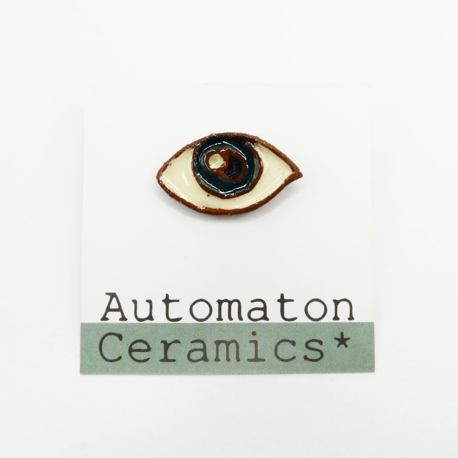 Ceramic eye pin badge, lapel pin, brooch.