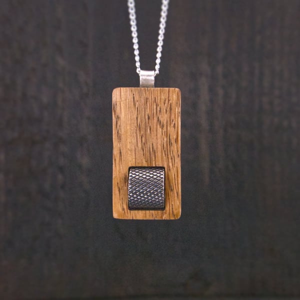 The First and Foremost No. 2 - Chestnut, steel and silver fidget pendant