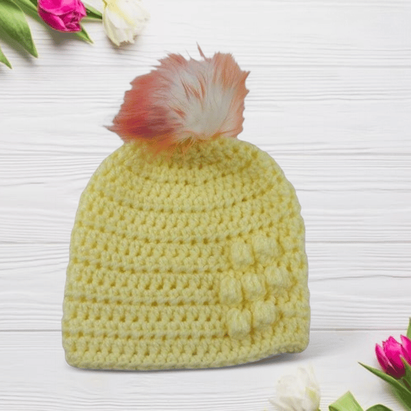 Lemon baby crocheted hat white faux fur pompom with orange purple & pink 