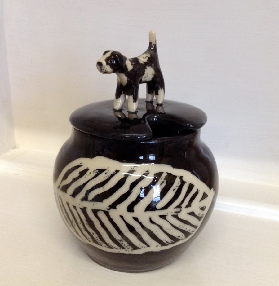 Stoneware lidded pot with little dog on the lid