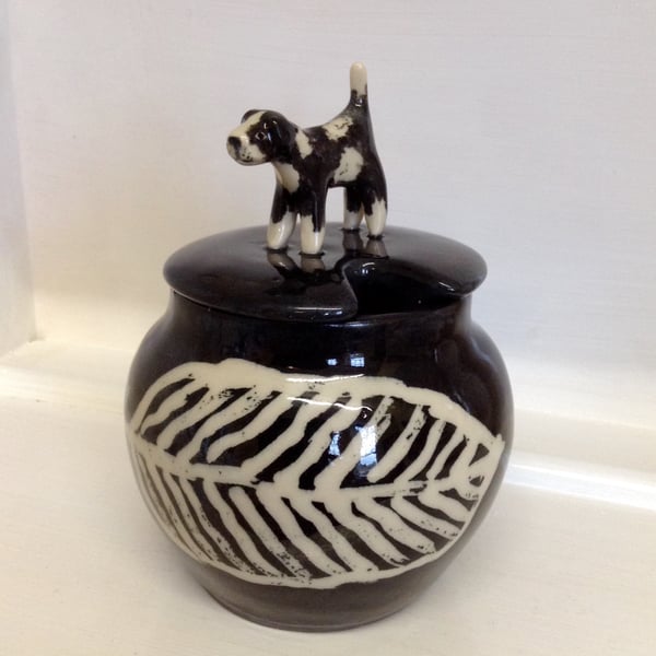 Stoneware lidded pot with little dog on the lid