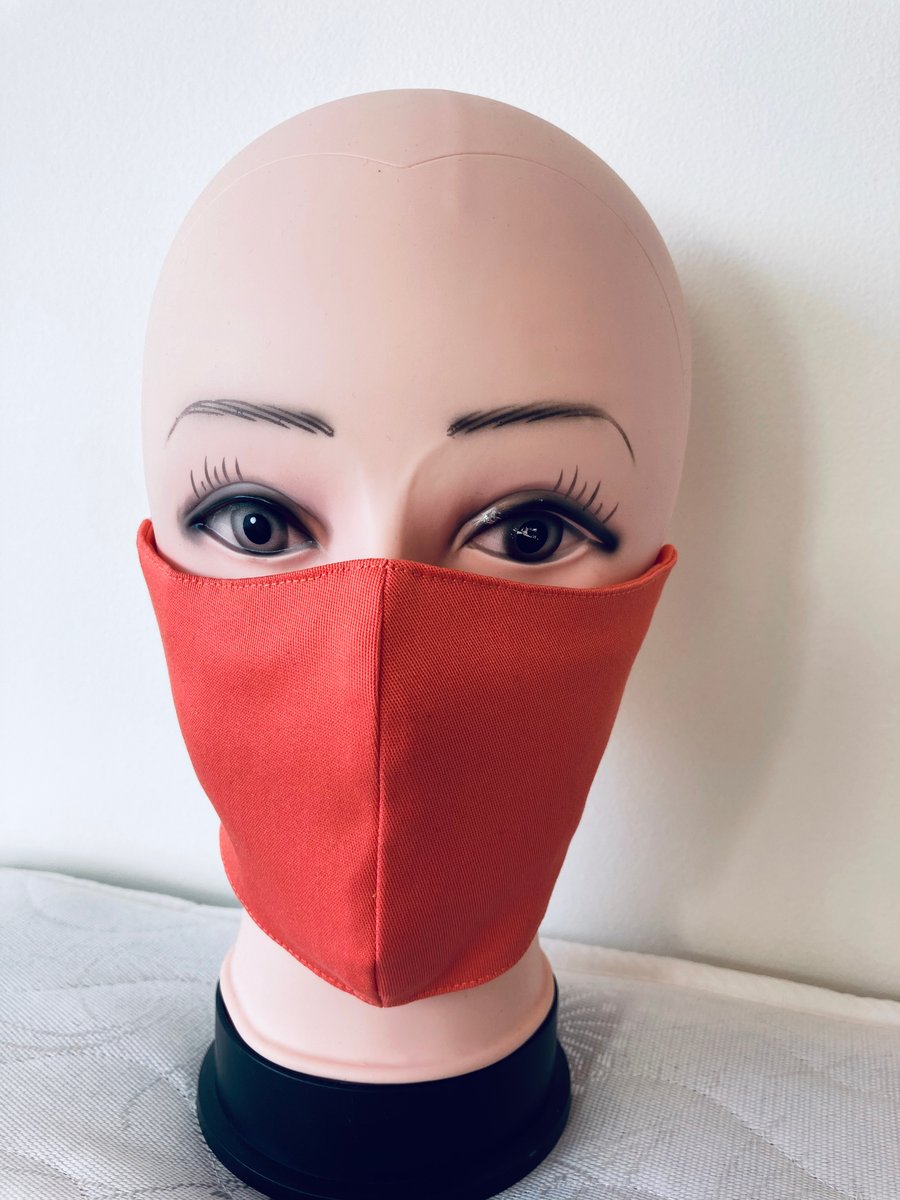Handmade 3 layers orange reusable adult face mask.