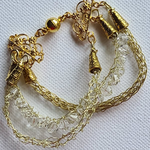 Gold crystal three stranded bracelet