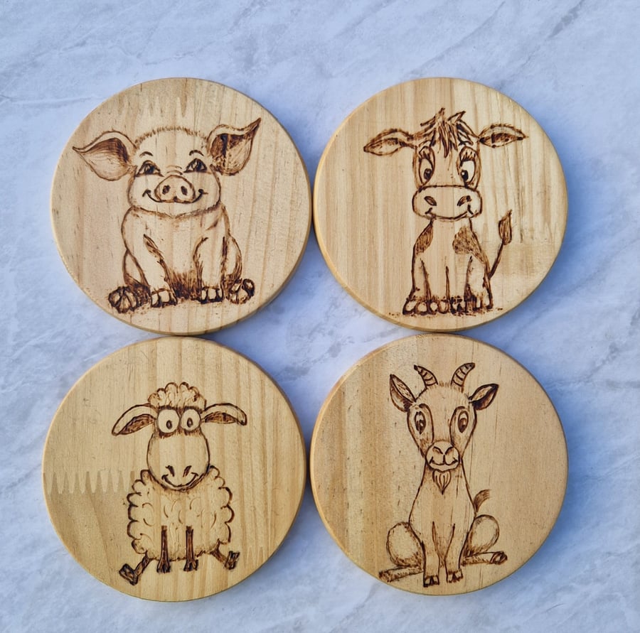 Burned wood coasters with farm animal theme